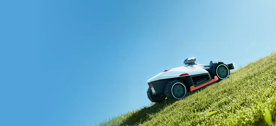 Quel robot tondeuse choisir pour un terrain en pente ?
